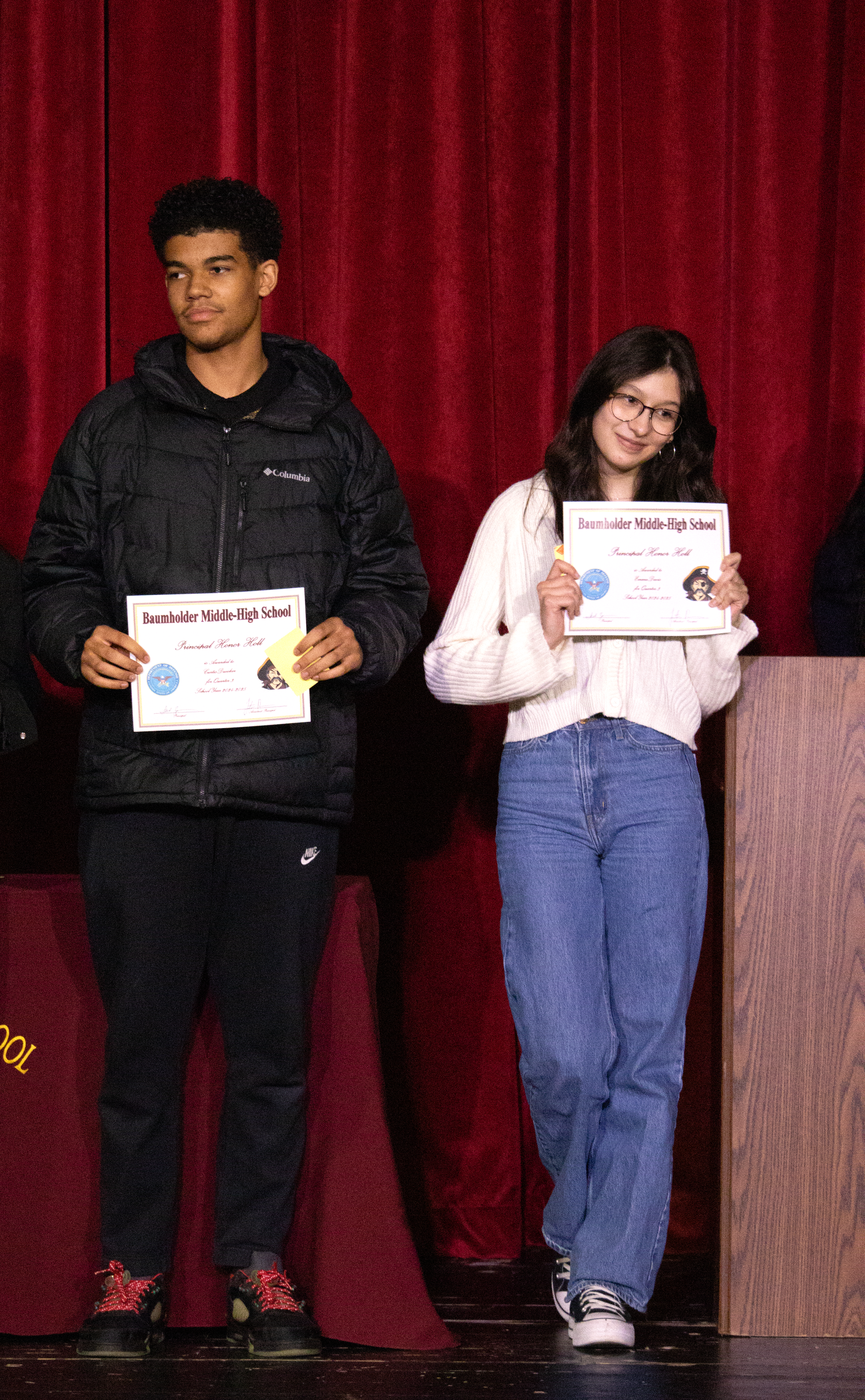 Curtis Dueker (left) and Emma Davis (right) accept their Honor Roll awards.